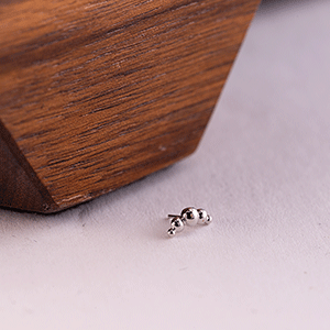 small white gold end piece for body jewellery