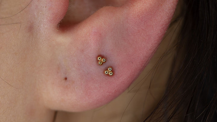 Double earlobe piercing
