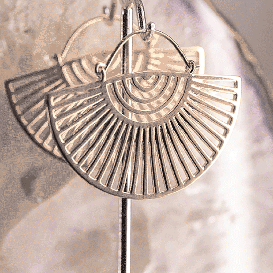 fan shaped gold earrings for healed piercings done in vancouver